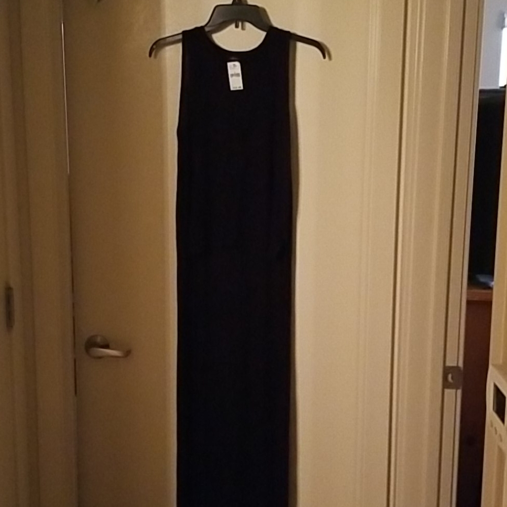NWT Black Sleeveless top with a long tail